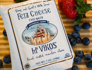Greek feta cheese made with sheep and goat's milk is a favorite addition to spinach and berry salad.