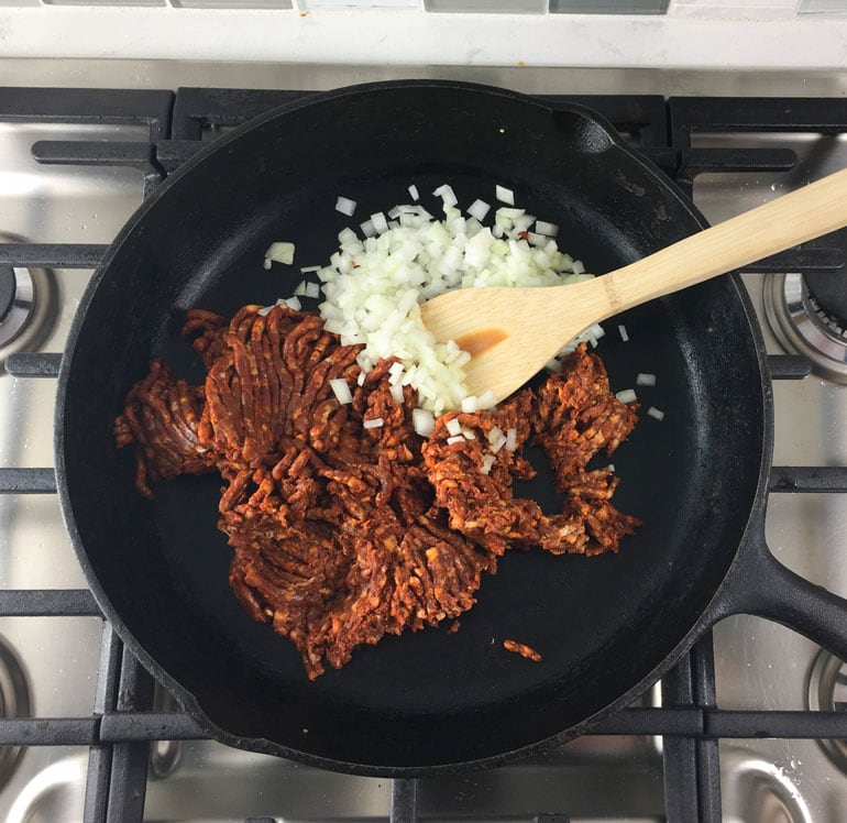 A simple filling of chorizo, onion and refried beans is perfect for topping tostadas or nachos.