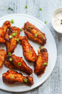 baked chicken wings with barbecue sauce and ranch dip
