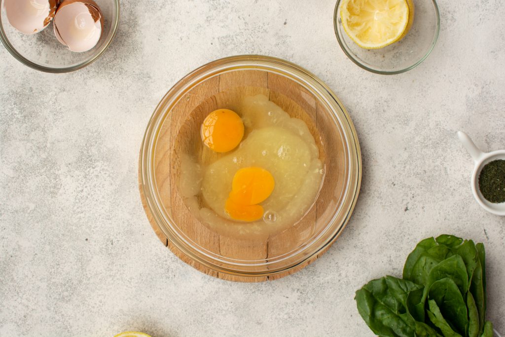 two eggs in a glass bowl